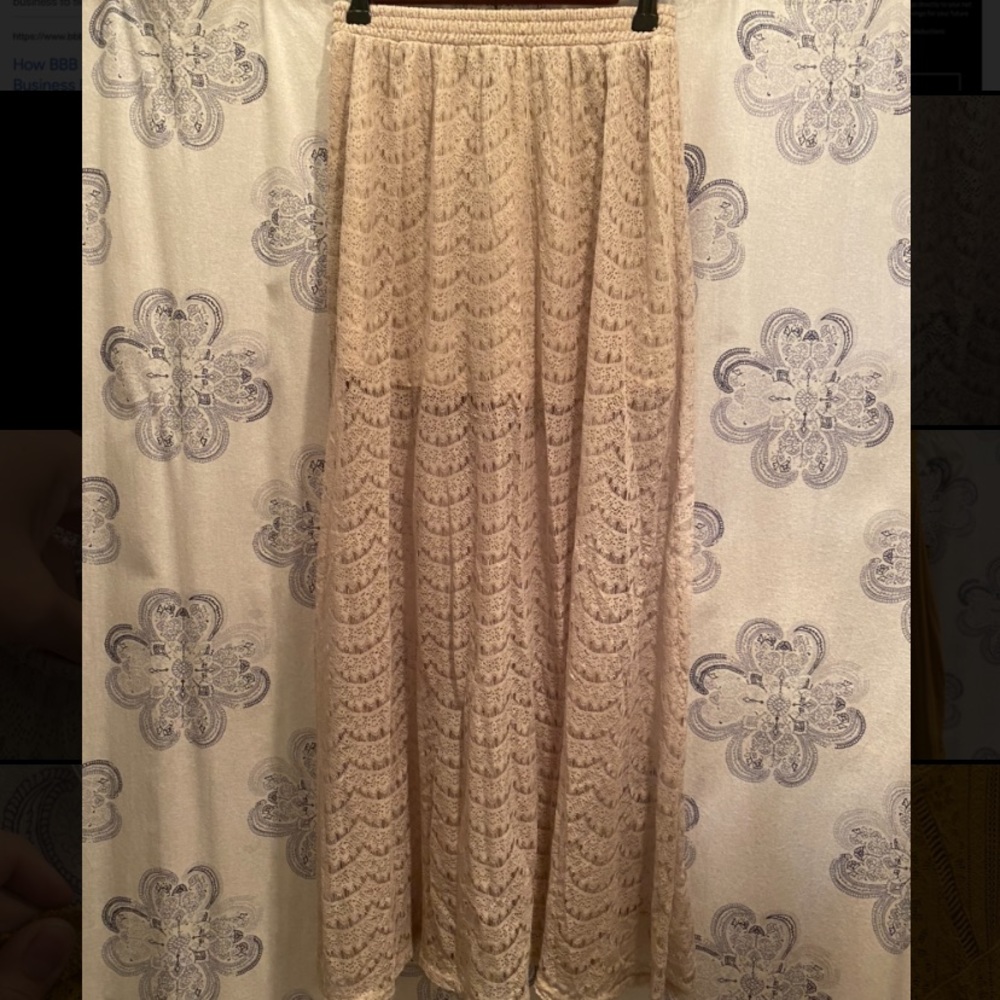 Forever 21 mini skirt with a lace long skirt overtop.